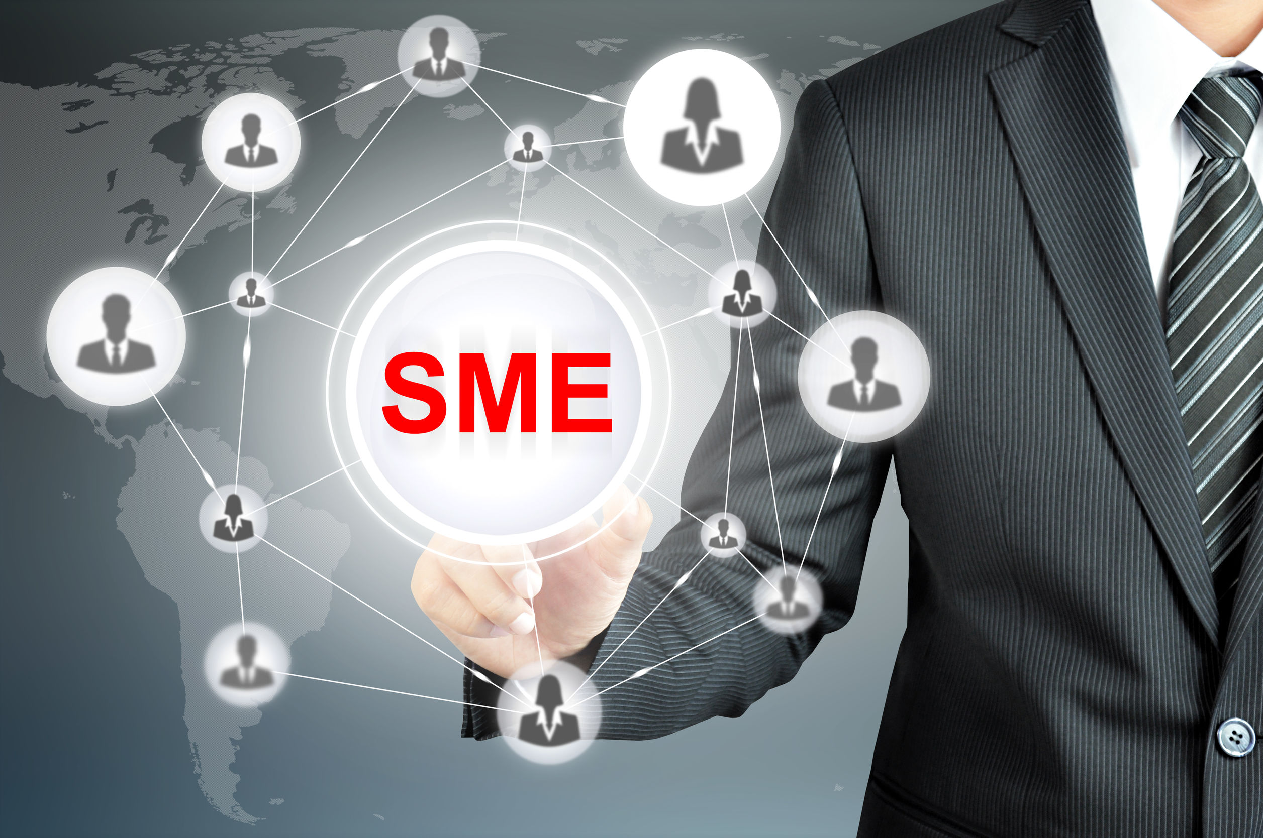 Businessman pointing on SME (Small & Medium Enterprise) sign on virtual screen with people icons linked as network